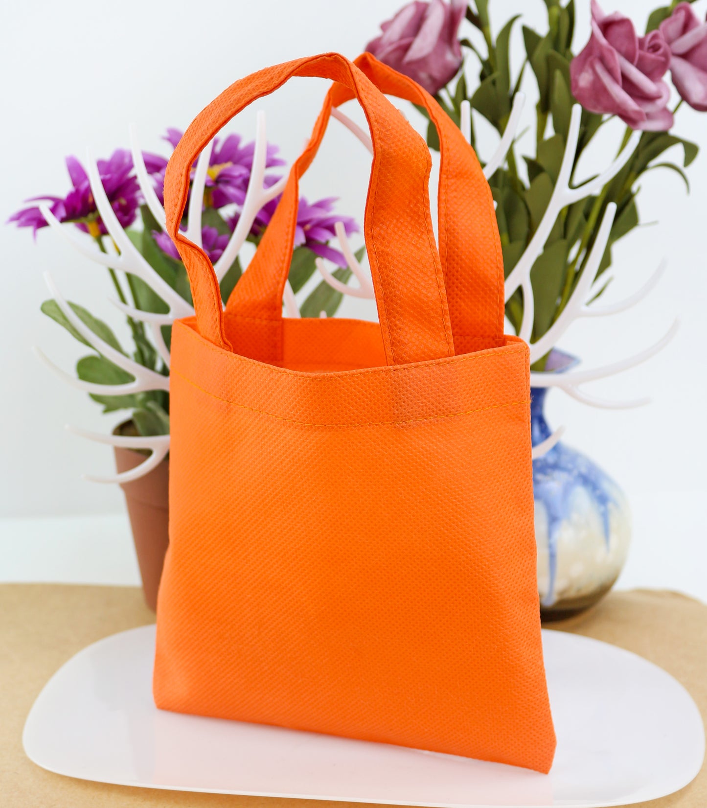 Colored non-woven handbag