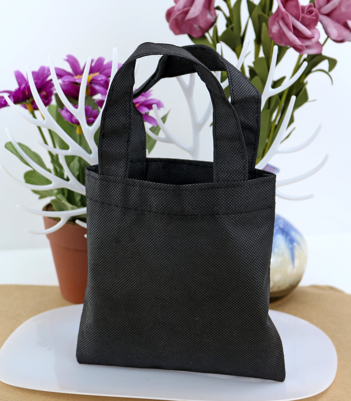 Colored non-woven handbag