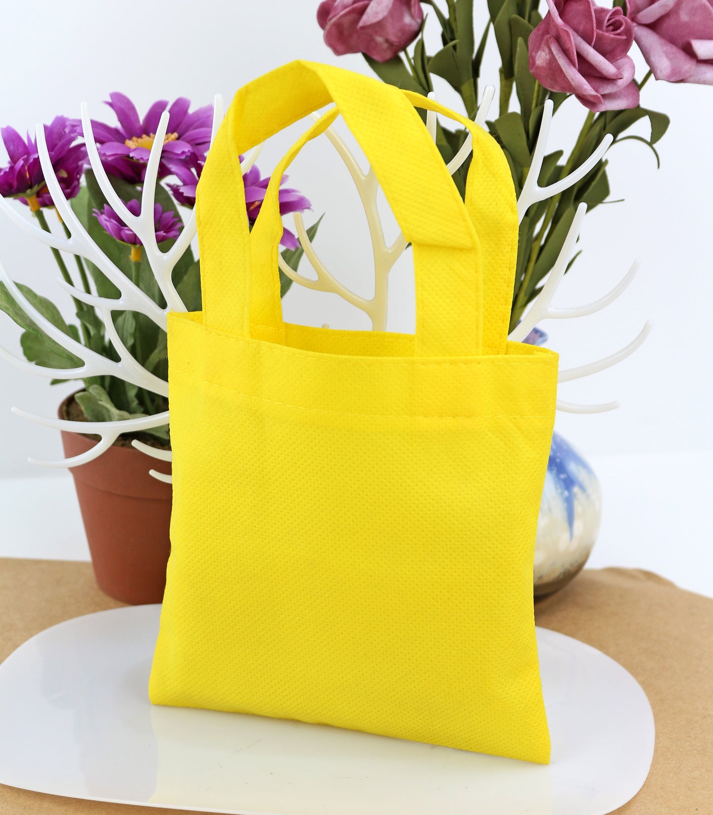 Colored non-woven handbag